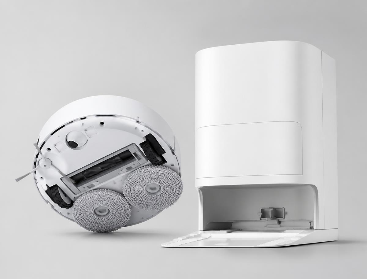 Eufy X10 Pro Omni self-emptying robots photographed on a light studio background